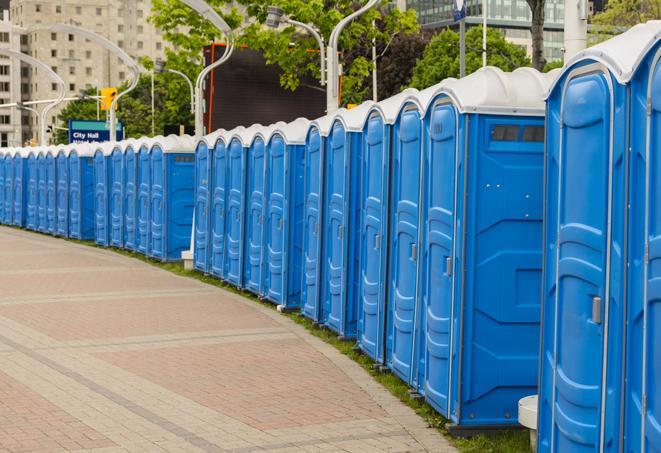 a row of portable restrooms at a fairground, offering visitors a clean and hassle-free experience in durham